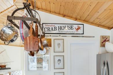Discover your ideal canal front cottage right in time for on Founders Club At St. James Plantation in North Carolina - for sale on GolfHomes.com, golf home, golf lot