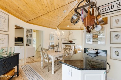 Discover your ideal canal front cottage right in time for on Founders Club At St. James Plantation in North Carolina - for sale on GolfHomes.com, golf home, golf lot