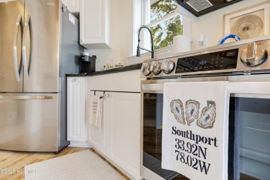 Discover your ideal canal front cottage right in time for on Founders Club At St. James Plantation in North Carolina - for sale on GolfHomes.com, golf home, golf lot