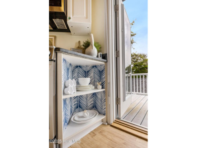 Discover your ideal canal front cottage right in time for on Founders Club At St. James Plantation in North Carolina - for sale on GolfHomes.com, golf home, golf lot