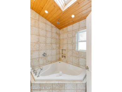 Discover your ideal canal front cottage right in time for on Founders Club At St. James Plantation in North Carolina - for sale on GolfHomes.com, golf home, golf lot
