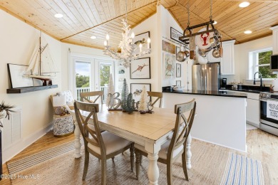 Discover your ideal canal front cottage right in time for on Founders Club At St. James Plantation in North Carolina - for sale on GolfHomes.com, golf home, golf lot