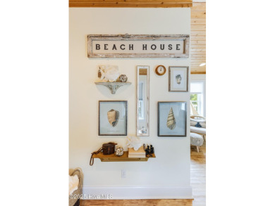 Discover your ideal canal front cottage right in time for on Founders Club At St. James Plantation in North Carolina - for sale on GolfHomes.com, golf home, golf lot