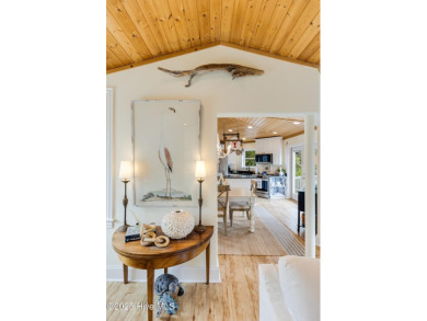 Discover your ideal canal front cottage right in time for on Founders Club At St. James Plantation in North Carolina - for sale on GolfHomes.com, golf home, golf lot