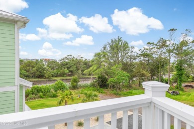 Discover your ideal canal front cottage right in time for on Founders Club At St. James Plantation in North Carolina - for sale on GolfHomes.com, golf home, golf lot