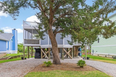 Discover your ideal canal front cottage right in time for on Founders Club At St. James Plantation in North Carolina - for sale on GolfHomes.com, golf home, golf lot
