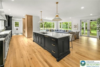 This STUNNING ESTATE is located within the single square mile of on  in Pennsylvania - for sale on GolfHomes.com, golf home, golf lot