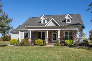 This beautiful 3-bedroom, 2.5-bath home is located in The on Sound Golf Links at Albemarle Plantation in North Carolina - for sale on GolfHomes.com, golf home, golf lot