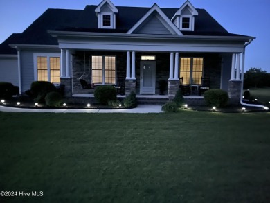 This beautiful 3-bedroom, 2.5-bath home is located in The on Sound Golf Links at Albemarle Plantation in North Carolina - for sale on GolfHomes.com, golf home, golf lot