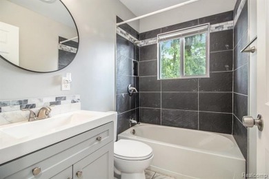 Nestled at the end of a quiet dead-end street, this beautifully on Lake Erie Metropark Golf Course in Michigan - for sale on GolfHomes.com, golf home, golf lot