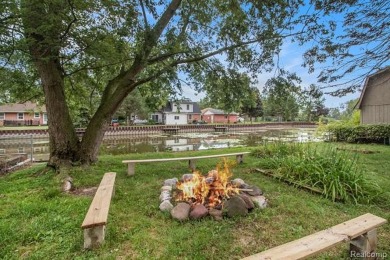 Nestled at the end of a quiet dead-end street, this beautifully on Lake Erie Metropark Golf Course in Michigan - for sale on GolfHomes.com, golf home, golf lot