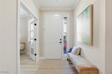 Discover effortless Florida living in this beautifully on Shadow Wood Preserve in Florida - for sale on GolfHomes.com, golf home, golf lot