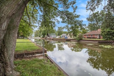 Nestled at the end of a quiet dead-end street, this beautifully on Lake Erie Metropark Golf Course in Michigan - for sale on GolfHomes.com, golf home, golf lot