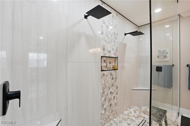 Discover effortless Florida living in this beautifully on Shadow Wood Preserve in Florida - for sale on GolfHomes.com, golf home, golf lot