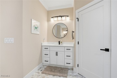 Discover effortless Florida living in this beautifully on Shadow Wood Preserve in Florida - for sale on GolfHomes.com, golf home, golf lot