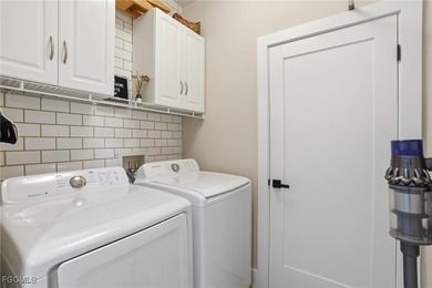 Discover effortless Florida living in this beautifully on Shadow Wood Preserve in Florida - for sale on GolfHomes.com, golf home, golf lot