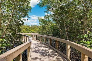 Discover effortless Florida living in this beautifully on Shadow Wood Preserve in Florida - for sale on GolfHomes.com, golf home, golf lot