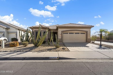 Wake up to sweeping views of the 18th tee from this impeccably on Coyote Lakes Golf Club in Arizona - for sale on GolfHomes.com, golf home, golf lot