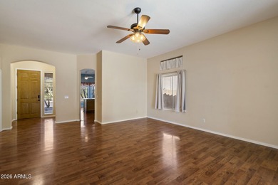 Wake up to sweeping views of the 18th tee from this impeccably on Coyote Lakes Golf Club in Arizona - for sale on GolfHomes.com, golf home, golf lot