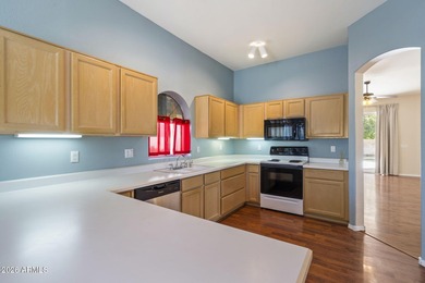 Wake up to sweeping views of the 18th tee from this impeccably on Coyote Lakes Golf Club in Arizona - for sale on GolfHomes.com, golf home, golf lot