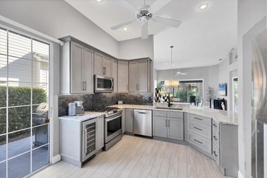 This move-in ready, updated, and impeccably maintained 2-bedroom on University Park Country Club in Florida - for sale on GolfHomes.com, golf home, golf lot