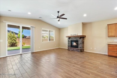 Discover comfort and functionality in this inviting home on Antelope Hills Golf Courses in Arizona - for sale on GolfHomes.com, golf home, golf lot