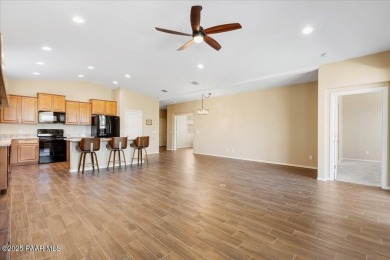 Discover comfort and functionality in this inviting home on Antelope Hills Golf Courses in Arizona - for sale on GolfHomes.com, golf home, golf lot