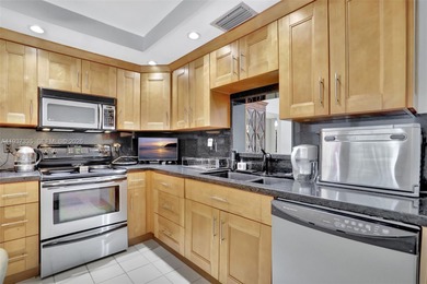 Welcome home to this desirable ground floor condo in one of the on Wynmoor Golf Course in Florida - for sale on GolfHomes.com, golf home, golf lot