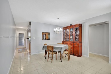 Welcome home to this desirable ground floor condo in one of the on Wynmoor Golf Course in Florida - for sale on GolfHomes.com, golf home, golf lot