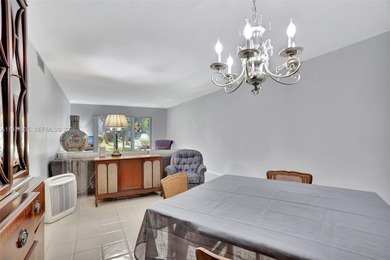 Welcome home to this desirable ground floor condo in one of the on Wynmoor Golf Course in Florida - for sale on GolfHomes.com, golf home, golf lot