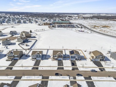 This spacious 4-bedroom + den, 2.5-bath home sits on a fenced-in on Blackberry Oaks Golf Course in Illinois - for sale on GolfHomes.com, golf home, golf lot