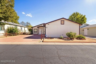 Tucked within the Villages at Lynx Creek, a vibrant 55+ on Quail Wood Greens Golf Course in Arizona - for sale on GolfHomes.com, golf home, golf lot