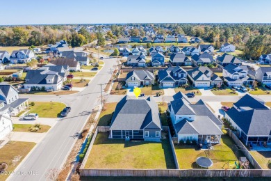 Welcome to this magnificent southern charmer surrounded by on Topsail Green Golf Club in North Carolina - for sale on GolfHomes.com, golf home, golf lot