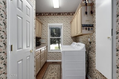 Beautiful custom-built home, situated on the 16th hole of the on Toqua Golf Course - Loudon County in Tennessee - for sale on GolfHomes.com, golf home, golf lot
