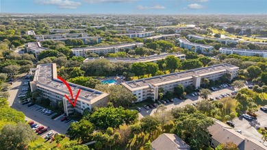 Welcome home to this desirable ground floor condo in one of the on Wynmoor Golf Course in Florida - for sale on GolfHomes.com, golf home, golf lot