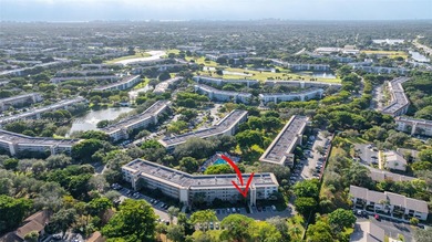 Welcome home to this desirable ground floor condo in one of the on Wynmoor Golf Course in Florida - for sale on GolfHomes.com, golf home, golf lot