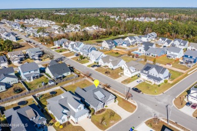 Welcome to this magnificent southern charmer surrounded by on Topsail Green Golf Club in North Carolina - for sale on GolfHomes.com, golf home, golf lot