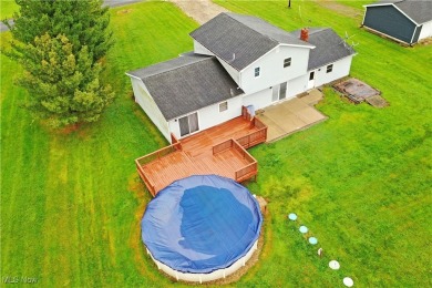 Warm up your cool autumn nights with this exciting Newton Falls on Duck Creek Golf Club, Inc in Ohio - for sale on GolfHomes.com, golf home, golf lot