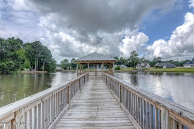 Welcome to this magnificent southern charmer surrounded by on Topsail Green Golf Club in North Carolina - for sale on GolfHomes.com, golf home, golf lot