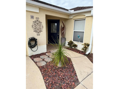 This home is in a desirable area and features an extra room off on Bacall Executive Golf Course in Florida - for sale on GolfHomes.com, golf home, golf lot