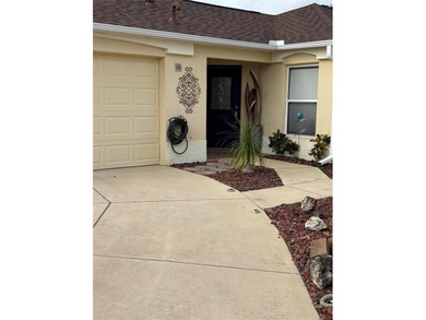 This home is in a desirable area and features an extra room off on Bacall Executive Golf Course in Florida - for sale on GolfHomes.com, golf home, golf lot