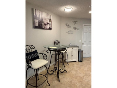 This home is in a desirable area and features an extra room off on Bacall Executive Golf Course in Florida - for sale on GolfHomes.com, golf home, golf lot