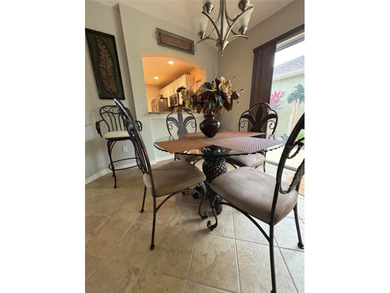 This home is in a desirable area and features an extra room off on Bacall Executive Golf Course in Florida - for sale on GolfHomes.com, golf home, golf lot