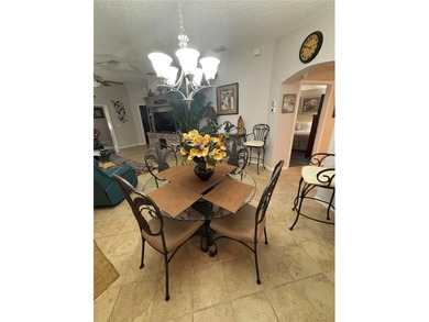 This home is in a desirable area and features an extra room off on Bacall Executive Golf Course in Florida - for sale on GolfHomes.com, golf home, golf lot