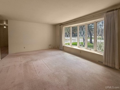 Enjoy the benefits of one-level living in this 3 bedroom, 2 bath on Pine Grove Country Club in Michigan - for sale on GolfHomes.com, golf home, golf lot