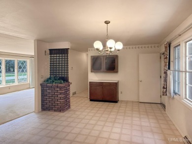 Enjoy the benefits of one-level living in this 3 bedroom, 2 bath on Pine Grove Country Club in Michigan - for sale on GolfHomes.com, golf home, golf lot