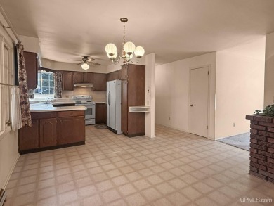 Enjoy the benefits of one-level living in this 3 bedroom, 2 bath on Pine Grove Country Club in Michigan - for sale on GolfHomes.com, golf home, golf lot