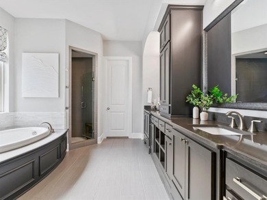 Discover unparalleled luxury living in this multigenerational on The Tribute At the Colony in Texas - for sale on GolfHomes.com, golf home, golf lot