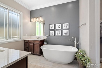 Seller is motivated! Custom ranch-style home blending elegance & on Pelican Lakes Golf and Country Club in Colorado - for sale on GolfHomes.com, golf home, golf lot