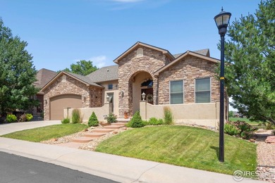 Seller is motivated! Custom ranch-style home blending elegance & on Pelican Lakes Golf and Country Club in Colorado - for sale on GolfHomes.com, golf home, golf lot